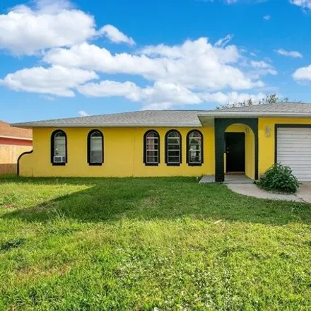 Buy this 3 bed house on 856 Consumer Street Southeast in Palm Bay, FL 32909