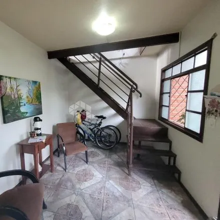 Buy this 3 bed house on Rua Donário de Oliveira in Feitoria, São Leopoldo - RS