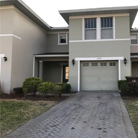 Rent this 3 bed townhouse on 2032 Cypress Bay Boulevard in Kissimmee, FL 34743