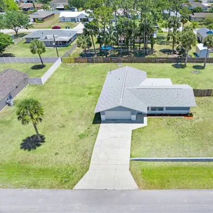Image 5 - 523 Audubon Avenue Northeast, Palm Bay, FL 32907, USA - House for sale