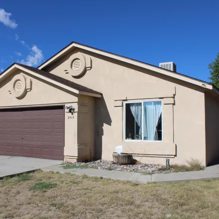Buy this 3 bed house on 2415 Cosmos Drive Southwest in Albuquerque, NM 87121