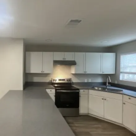 Rent this 3 bed apartment on 2532 Millmar Drive in Peavy Park, Dallas