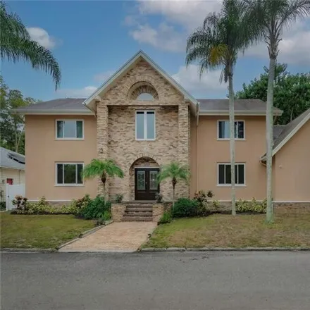 Buy this 5 bed house on 3100 South Canal Drive in East Lake, FL 34684