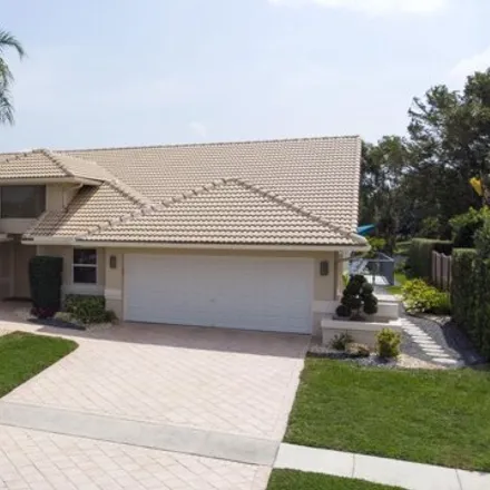 Buy this 4 bed house on 2656 Northwest 48th Street in Boca Raton, FL 33434