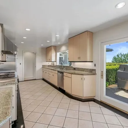 Rent this 4 bed apartment on 9656 Lawlen Way in Beverly Hills, CA 90210