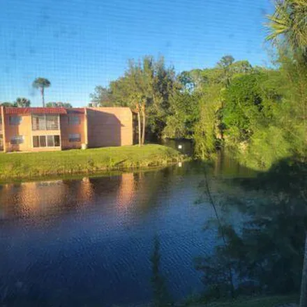 Rent this 2 bed apartment on 1999 Golden Lakes Boulevard in West Palm Beach, FL 33411
