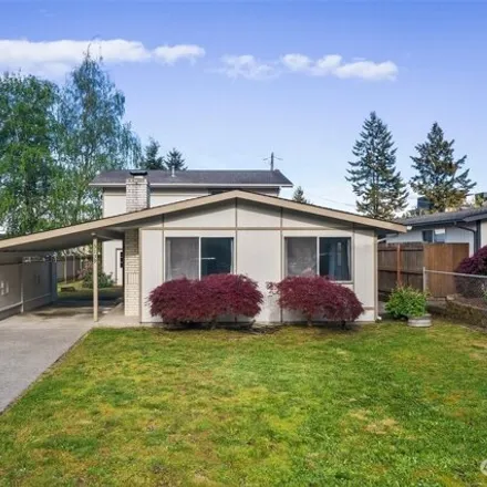 Buy this 4 bed house on 5215 North Visscher Street in Tacoma, WA 98407