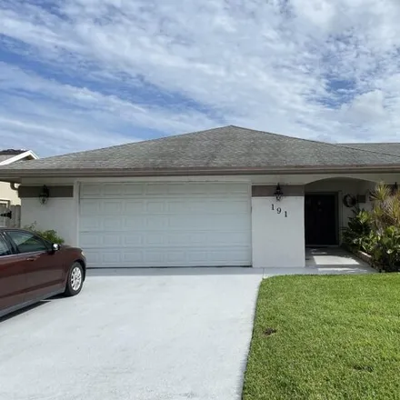 Rent this 3 bed house on 173 Parkwood Drive South in Royal Palm Beach, Palm Beach County