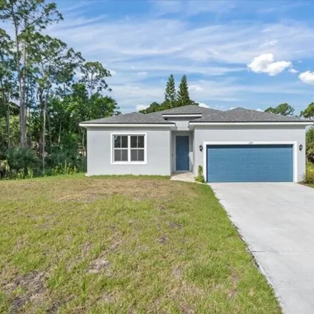 Buy this 4 bed house on 1179 Whisper Road Southeast in Palm Bay, FL 32909