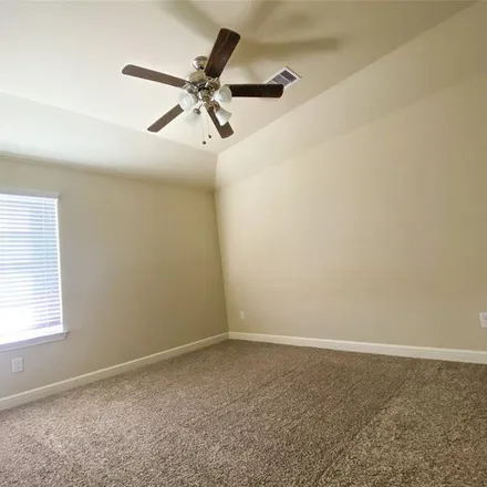 Rent this 4 bed apartment on 23743 Sweet Acacia Trail in Harris County, TX 77493