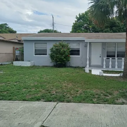 Buy this 3 bed house on 732 55th Street in West Palm Beach, FL 33407