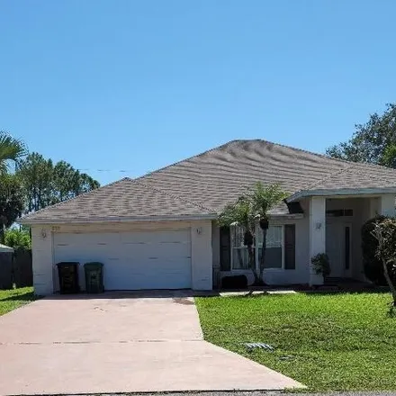 Buy this 3 bed house on 933 Southwest College Park Road in Port Saint Lucie, FL 34953