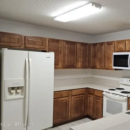 Rent this 3 bed condo on 5100 Playpen Dr Unit 9 in Jacksonville, Florida