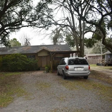 Buy this 3 bed house on 1047 East FM 1406 in Winnie, TX 77665