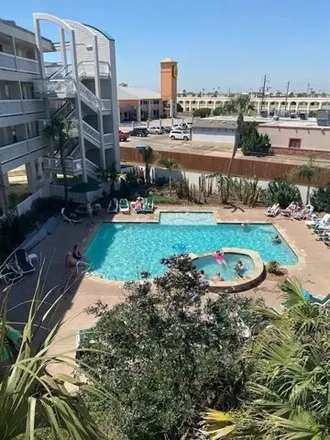 Rent this 1 bed condo on Hooters in 6028 Heards Lane, Galveston