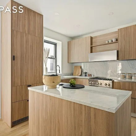 Rent this 3 bed townhouse on 917 Saint Marks Avenue in New York, NY 11213
