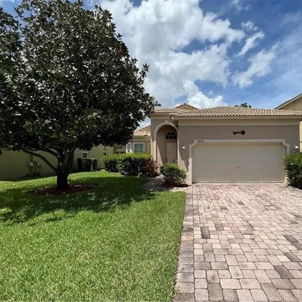 Rent this 4 bed house on 5750 Sunberry Circle in Lakewood Park, FL 34951