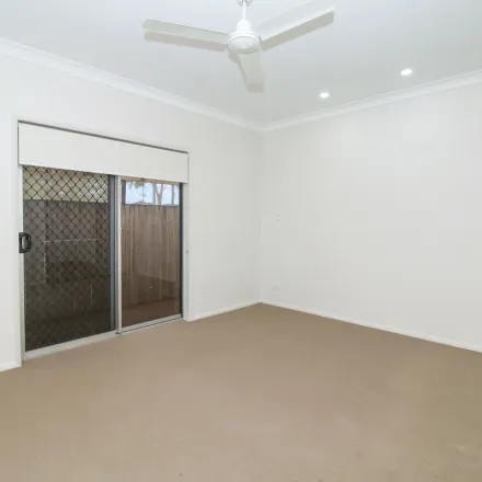 Rent this 4 bed apartment on 34 Golf Links Drive in Kirwan QLD 4817, Australia