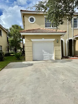 Rent this 3 bed townhouse on 12115 Southwest 5th Court in Pembroke Pines, FL 33025