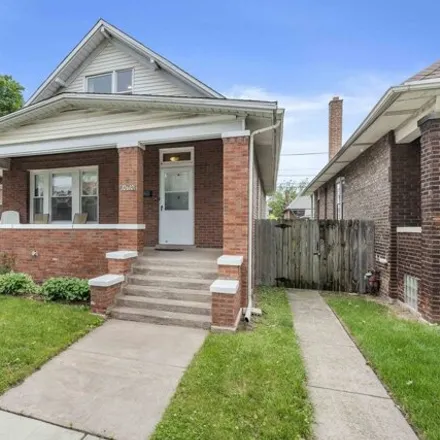 Buy this 4 bed house on 10610 South Avenue F in Chicago, IL 60617