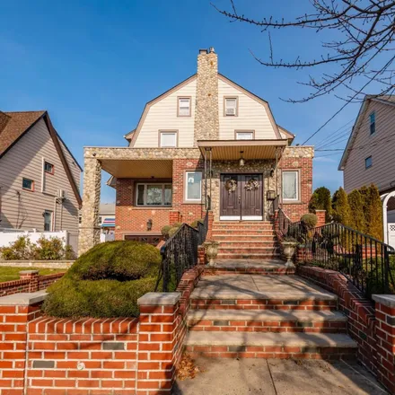 Buy this 9 bed townhouse on 95-11 160th Avenue in New York, NY 11414