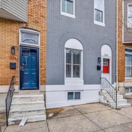 Rent this 3 bed house on 2318 Guilford Ave in Baltimore, Maryland
