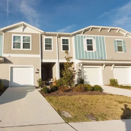 Rent this 3 bed townhouse on Seaside Charter School in Beach Preserve Way, Oak Harbor