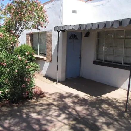 Rent this 1 bed house on East 1st Street in Tucson, AZ 85712