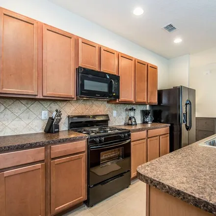 Rent this 4 bed townhouse on Orlando in Miller Street, Orlando