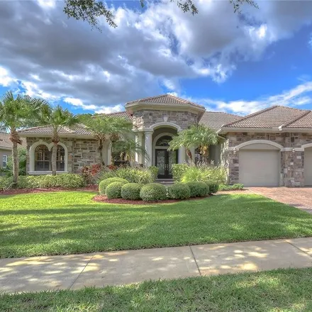 Buy this 4 bed house on 9714 Tree Tops Lake Road in Westchase, Hillsborough County