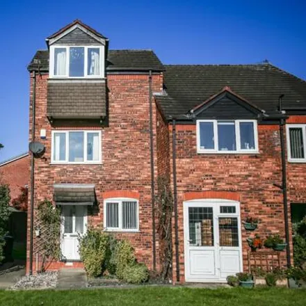 Buy this 3 bed townhouse on Crossgate Mews in Cheadle, SK4 3AP