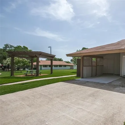 Buy this 3 bed townhouse on 774 Baruna Circle in Garland, TX 75043