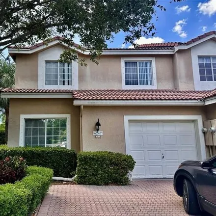 Buy this 4 bed townhouse on 6247 Northwest 74th Court in Parkland, FL 33067