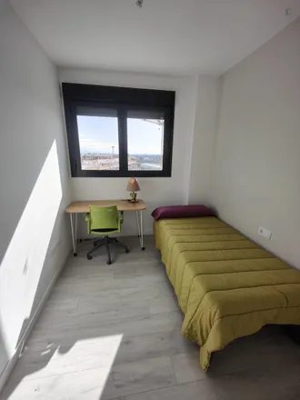 Rent this 3 bed room on Carrer de l'Estacioneta in 46024 Valencia, Spain