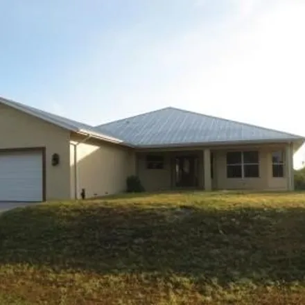 Buy this 4 bed house on 6199 Higgins Avenue in Lehigh Acres, FL 33905