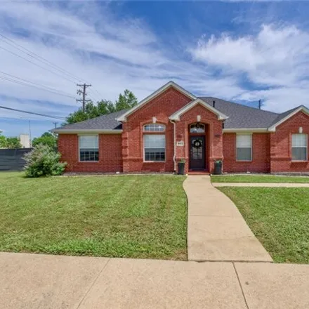 Buy this 4 bed house on 8613 Lakeside Dr in Rowlett, Texas