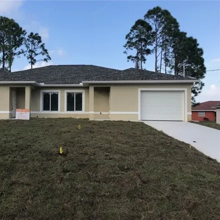 Rent this 2 bed house on 4658 26th Street Southwest in Lehigh Acres, FL 33973