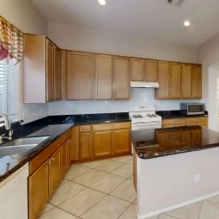 Rent this 4 bed apartment on 3022 East Buena Vista Drive in Solera Chandler, Chandler
