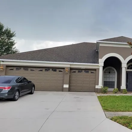 Buy this 5 bed loft on 14518 Arborglades Drive in Spring Hill, FL 34609