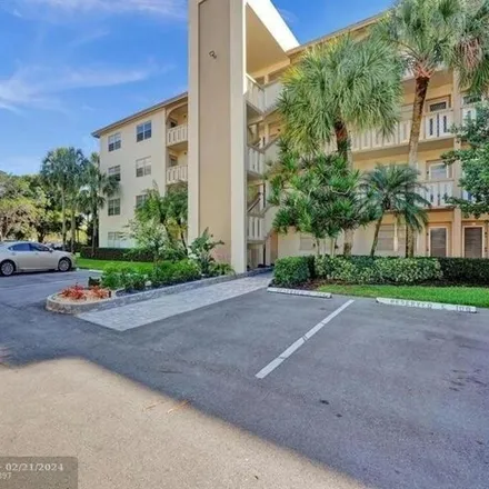 Rent this 2 bed condo on 2335 Lucaya Lane in Coconut Creek, FL 33066