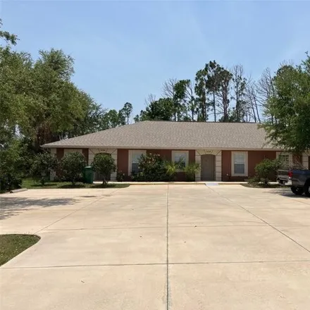 Rent this 2 bed house on 1474 Capricorn Boulevard in Charlotte County, FL 33983