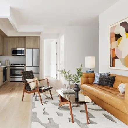 Buy this 2 bed condo on 477 Woodward Avenue in New York, NY 11385