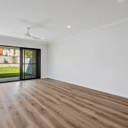 Rent this 3 bed apartment on Phar Lap Circuit in Thrumster NSW 2444, Australia