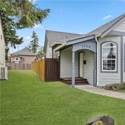 Buy this 2 bed house on 3570 East J Street in Tacoma, WA 98404