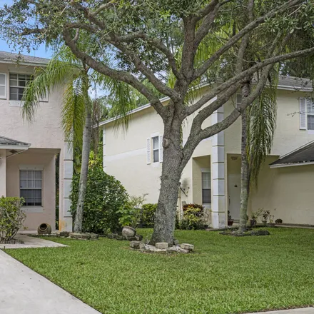 Rent this 3 bed townhouse on 130 Baldwin Boulevard in Southwind Manor, Greenacres