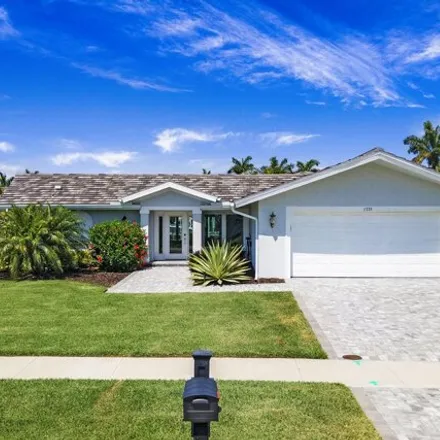 Buy this 3 bed house on 1715 Hummingbird Court in Marco Island, FL 34145