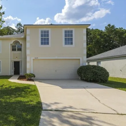 Buy this 4 bed house on 10200 Woodley Creek Road West in Jacksonville, FL 32218