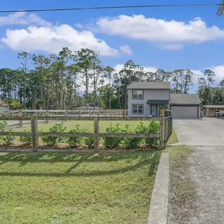 Buy this 4 bed house on 13122 86th Road North in Palm Beach County, FL 33412