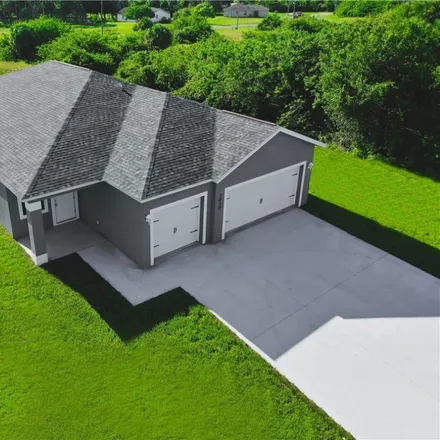 Buy this 3 bed house on 1892 Jacinto Avenue in Lehigh Acres, FL 33972