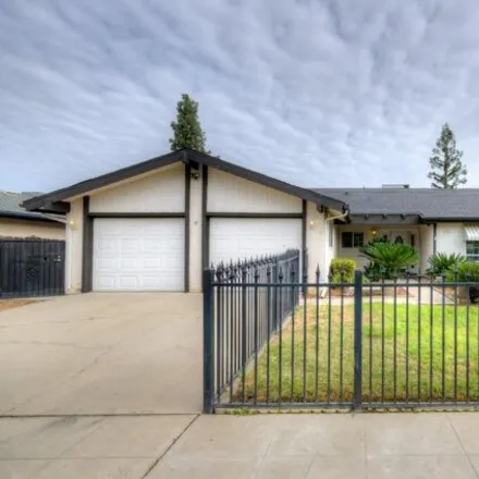 Buy this 3 bed house on 3054 East Los Altos Avenue in Fresno, CA 93710